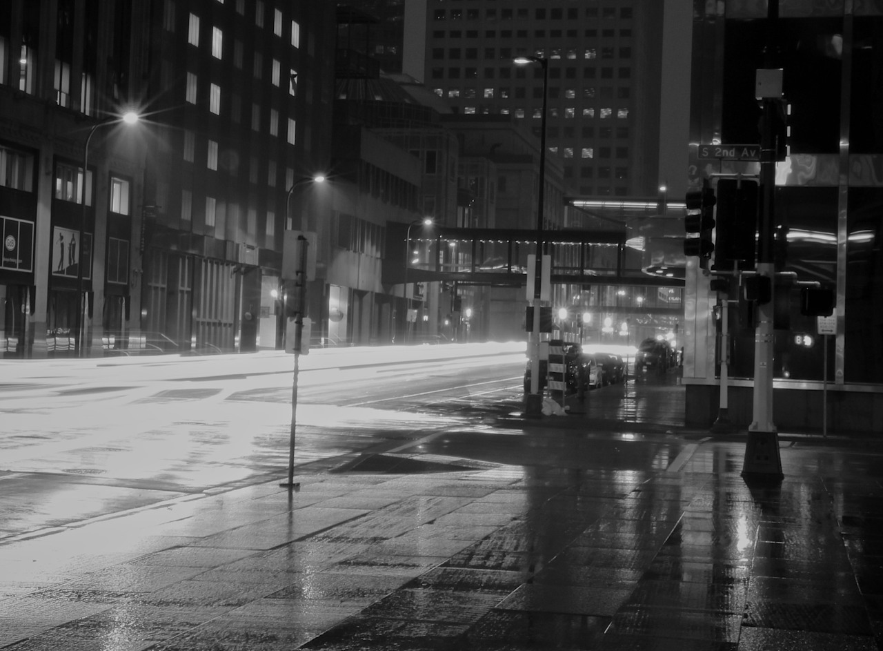 6th street rush hour in the rain.