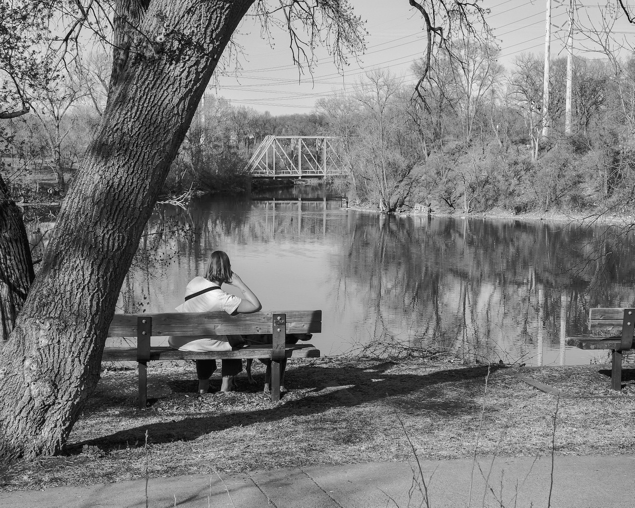 Sitting on a bench looking at the Mississippi River in the North Loop