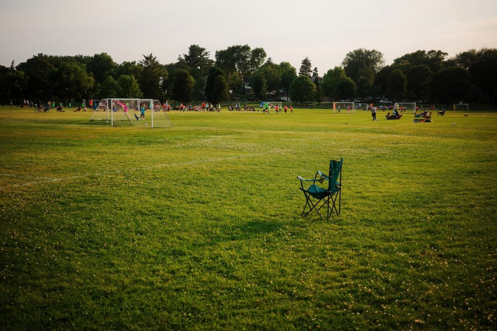 Empty chair watching soccer - Minneapolis